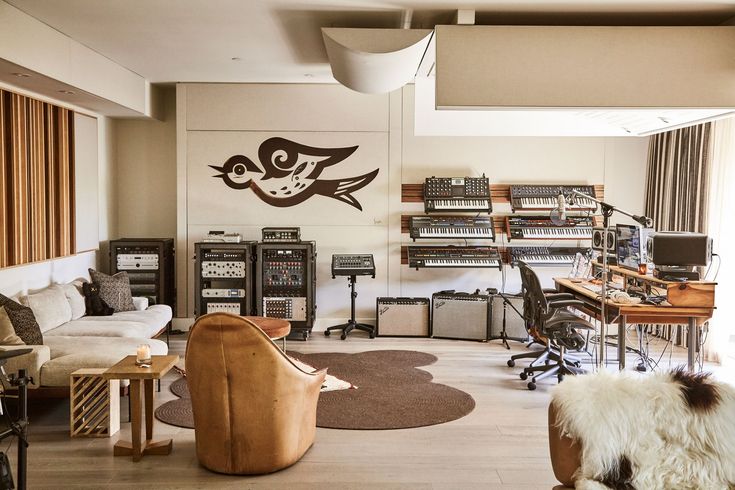 a living room filled with lots of furniture and decor