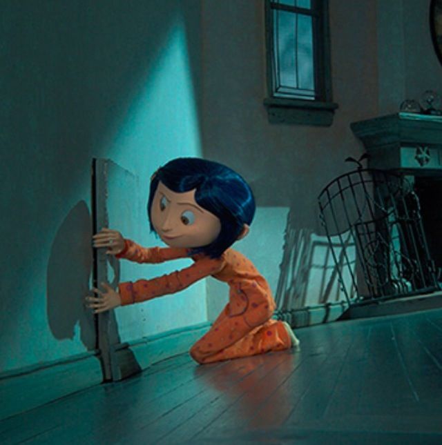 a cartoon doll is leaning against the wall in an empty room with a clock on the wall