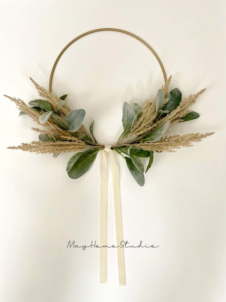 the headband is adorned with leaves and ribbons