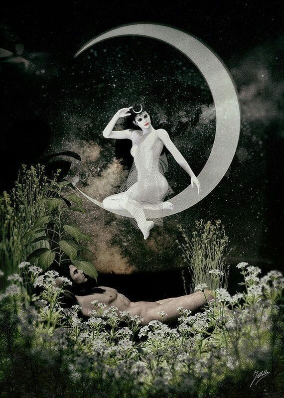 a woman sitting on top of a moon in the grass