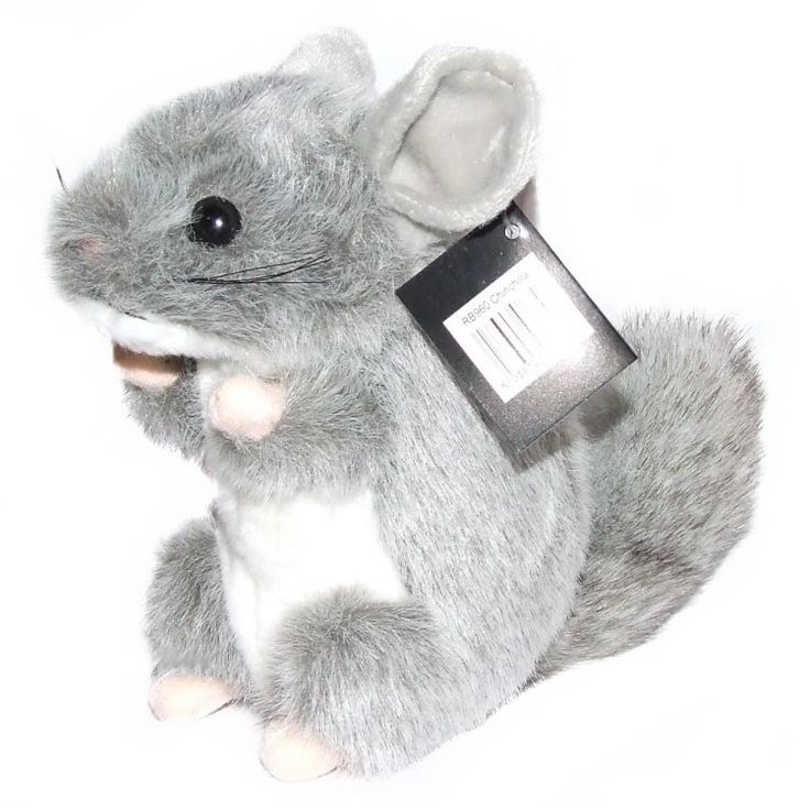 a stuffed animal mouse with tags on it's ears and tail, sitting in front of a white background