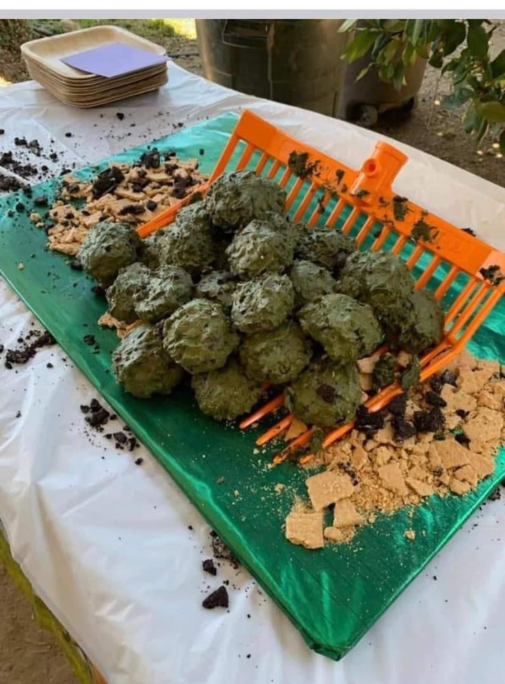 some food is laying out on a green tray