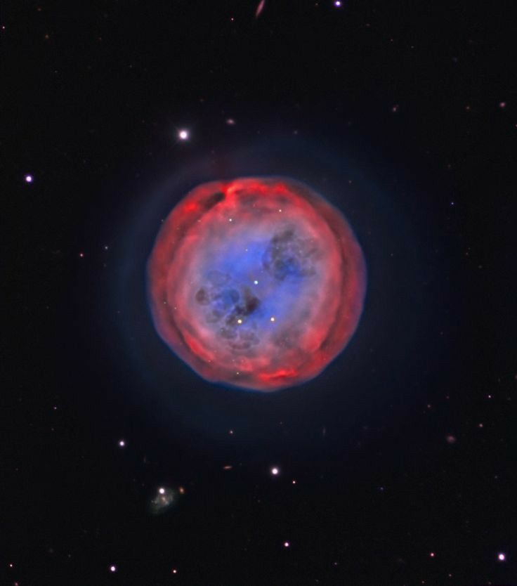 an image of a planetary object in the sky with red and blue colors on it