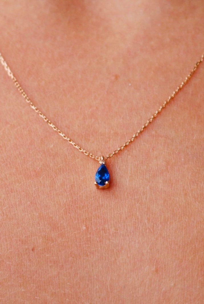 Pear drop tiny necklace made from 14k rose gold. This minimalist Sapphire CZ necklace is a nice gift to your love. charm wide : 3mm charm height : 7mm chain lenght : 17 inches Available Gold Options; 14K Gold 14K Rose Gold 14K White Gold Simple Gem Necklace, Sapphire Jewelry Necklace Simple, Sapphire And Gold Necklace, Gold Sapphire Jewelry, Gold Blue Jewelry, Dainty Sapphire Necklace, Sapphire Jewelry Aesthetic, Blue Jewelry Aesthetic, Gold And Blue Jewelry