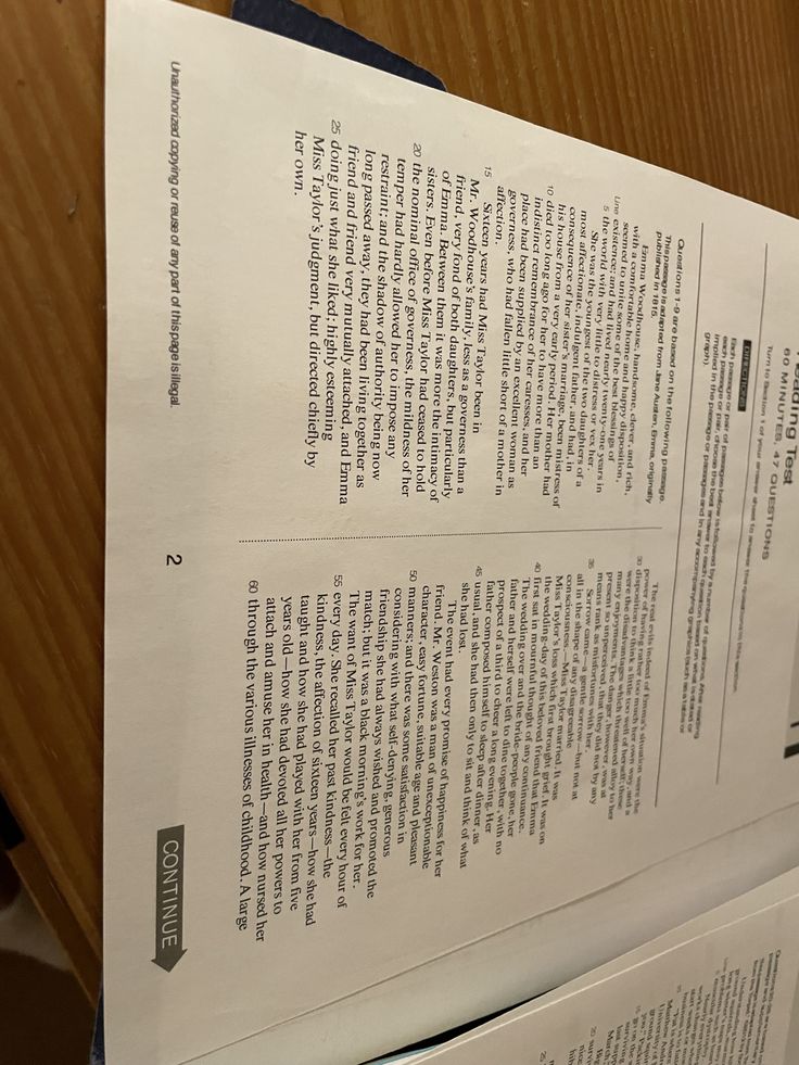 two papers are stacked on top of each other