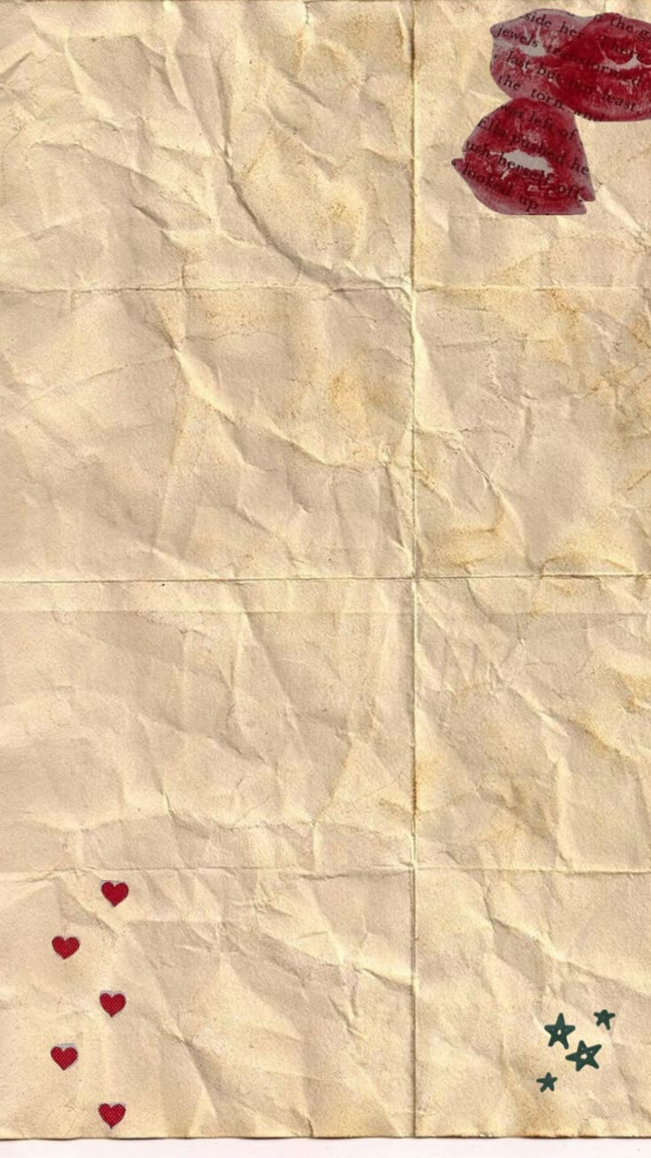 an old piece of paper with hearts and stars on it