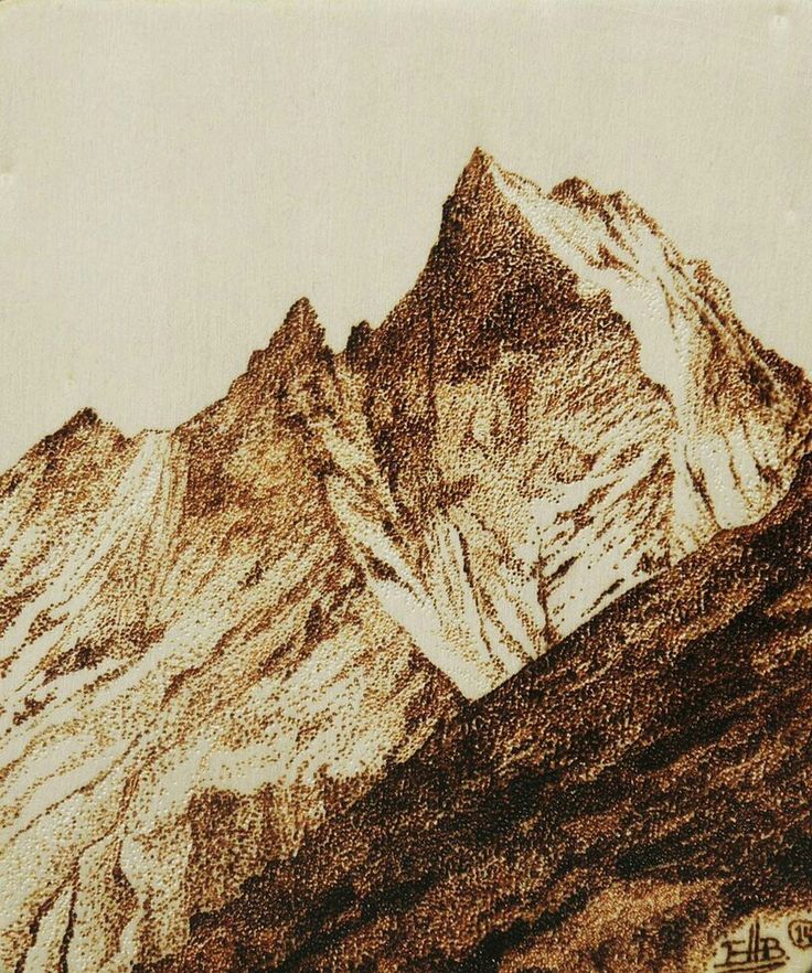 a drawing of a mountain range in brown and white ink with chinese writing on it