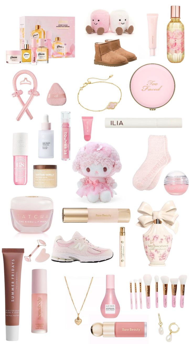 a bunch of items that are on top of a white surface with pink and gold accents