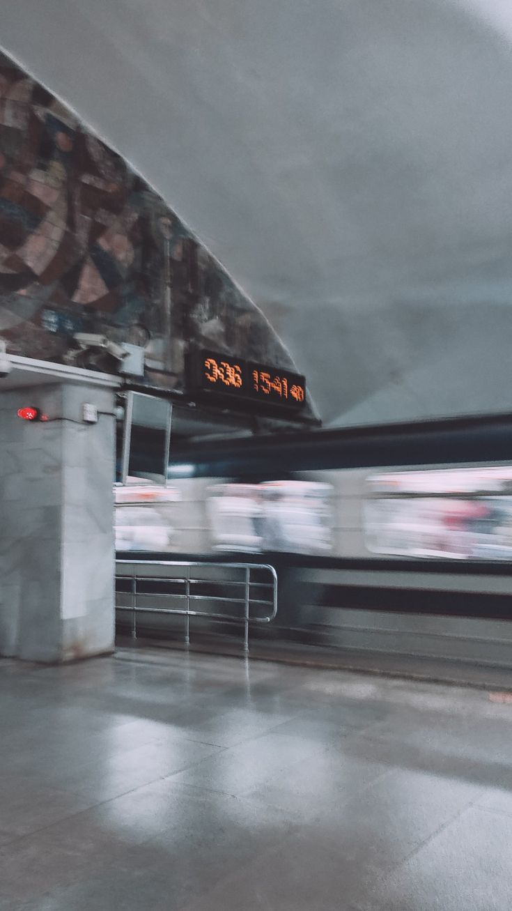 a train is passing by in the station