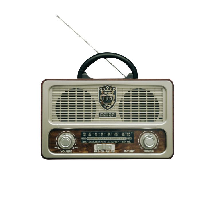 an old fashioned radio is on display against a white background and has a black handle