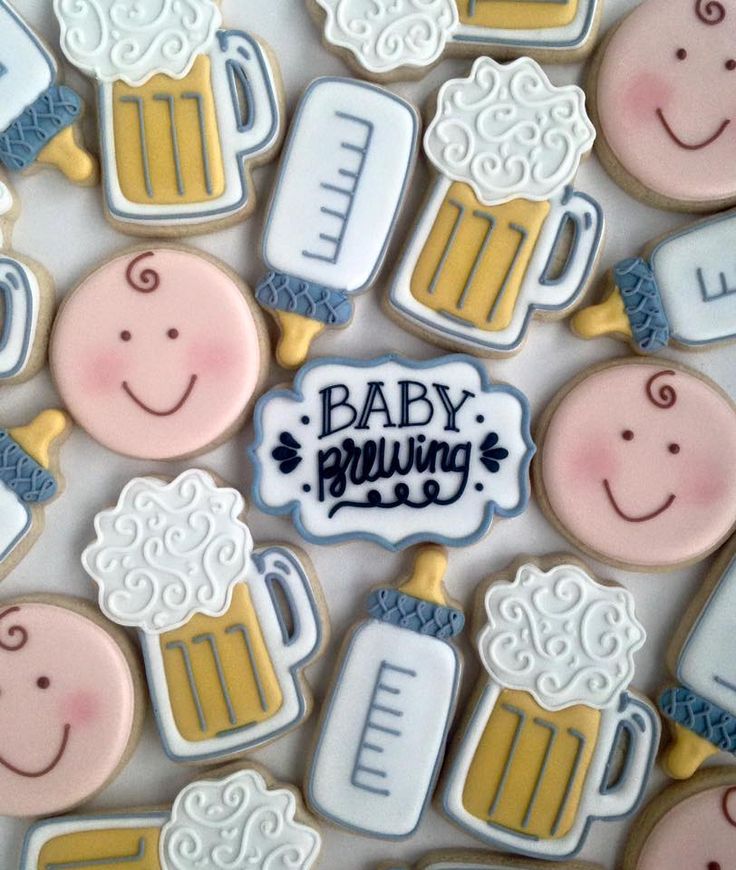 baby shower cookies with beer and smiling faces