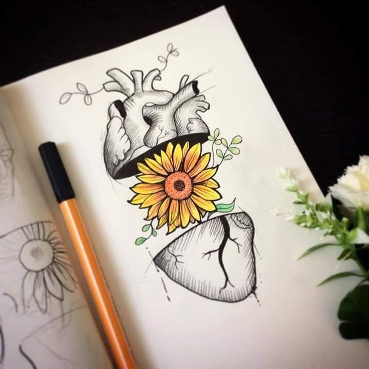 a drawing of a sunflower with a human heart on it's side and a pencil next to it