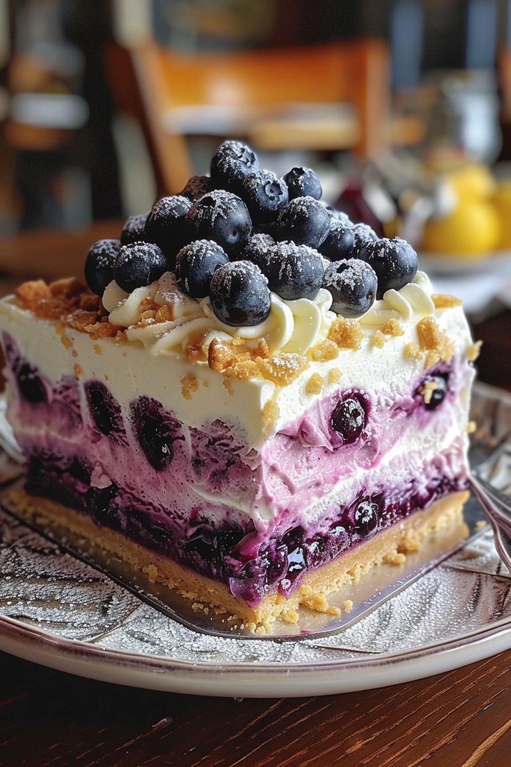 a piece of blueberry cheesecake on a plate