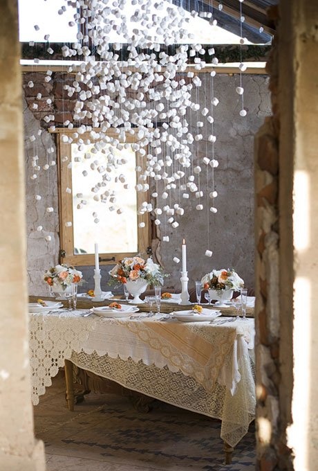 a dining room table is set with flowers and candles in front of a mirror that reads superior