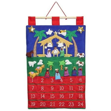 a christmas calendar hanging on a wall with nativity scene in the middle and stars above it