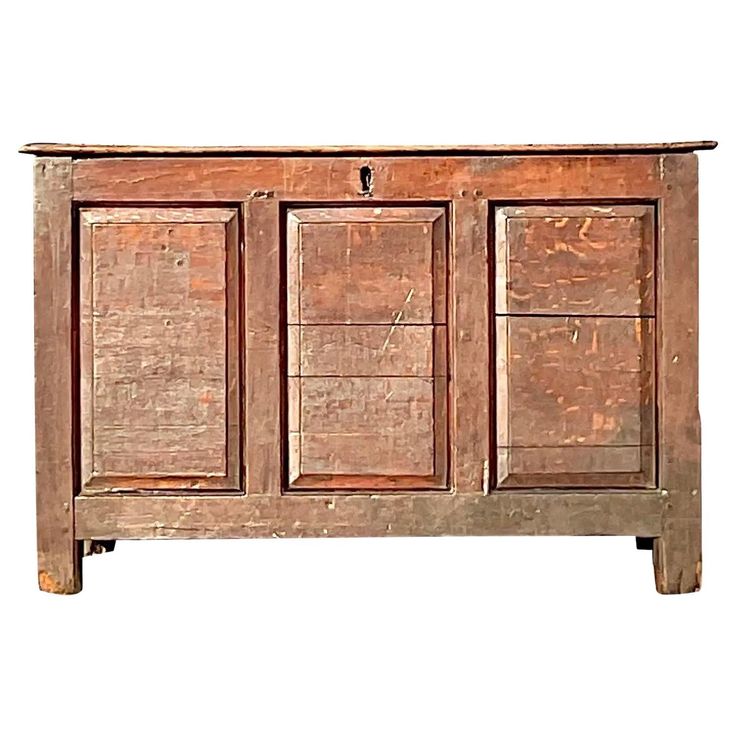 an old wooden cabinet with three drawers on one side and two doors on the other