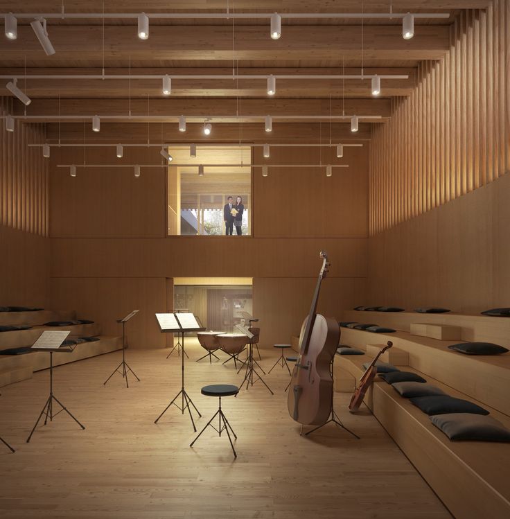 an empty room filled with musical instruments and tables