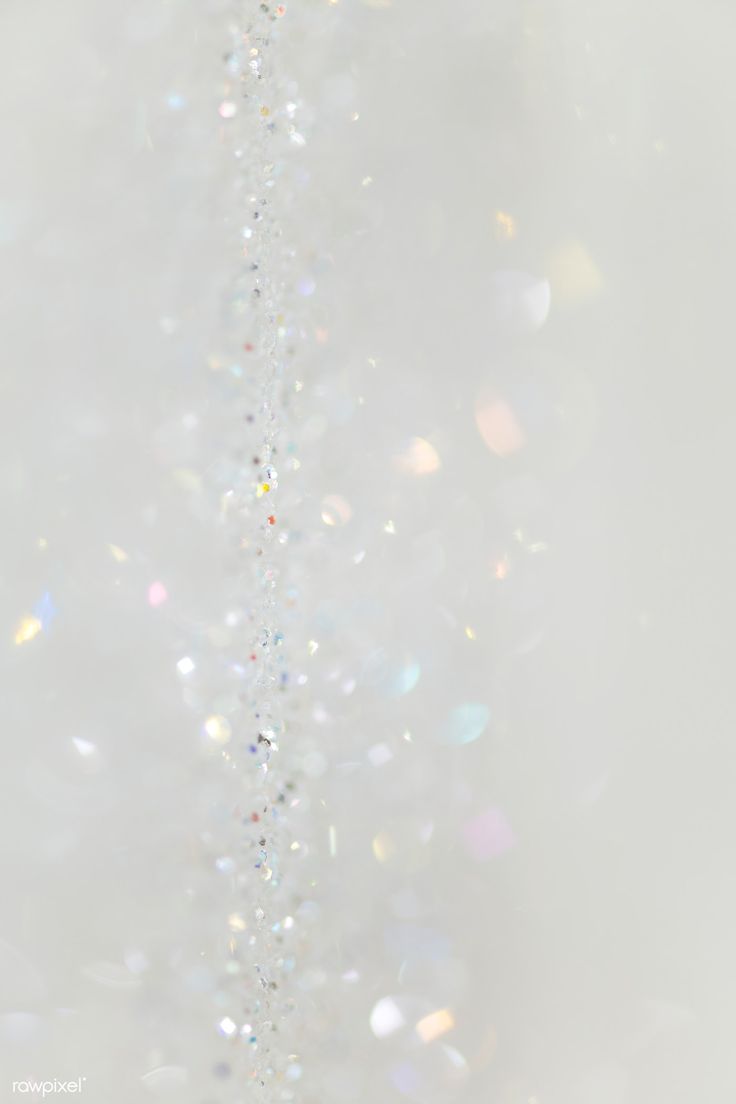 a white background with lots of bubbles and confetti hanging from the top of it