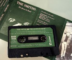 an old black and green cassette with the smiths on it