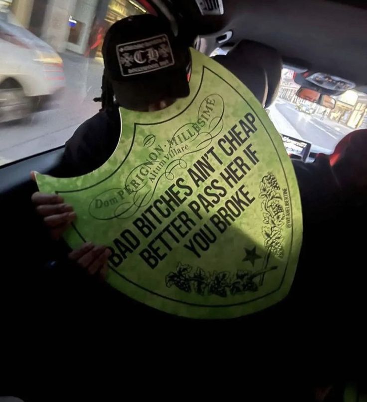 a person in a car with a bib on