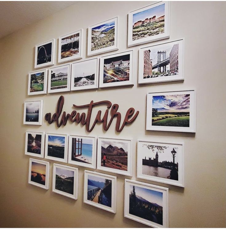 there is a wall with many pictures on it and the word adventure spelled in cursive letters