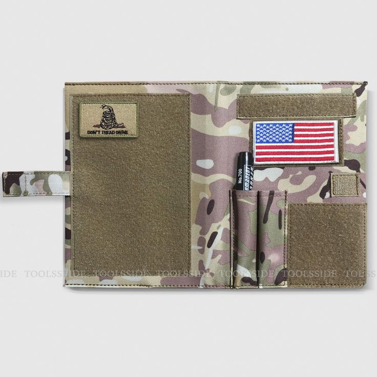 an army camouflage wallet with a flag patch on it