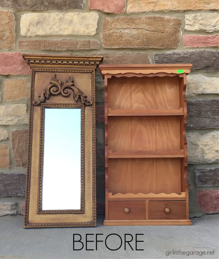 an old dresser with a mirror next to it on the ground and another piece of furniture that has been turned into a shelf