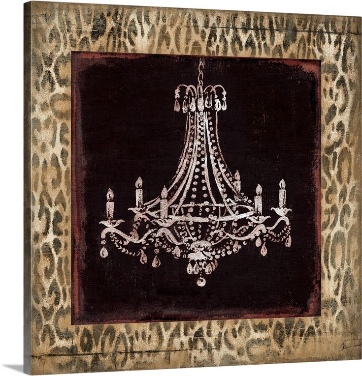 an ornate chandelier is framed in leopard print