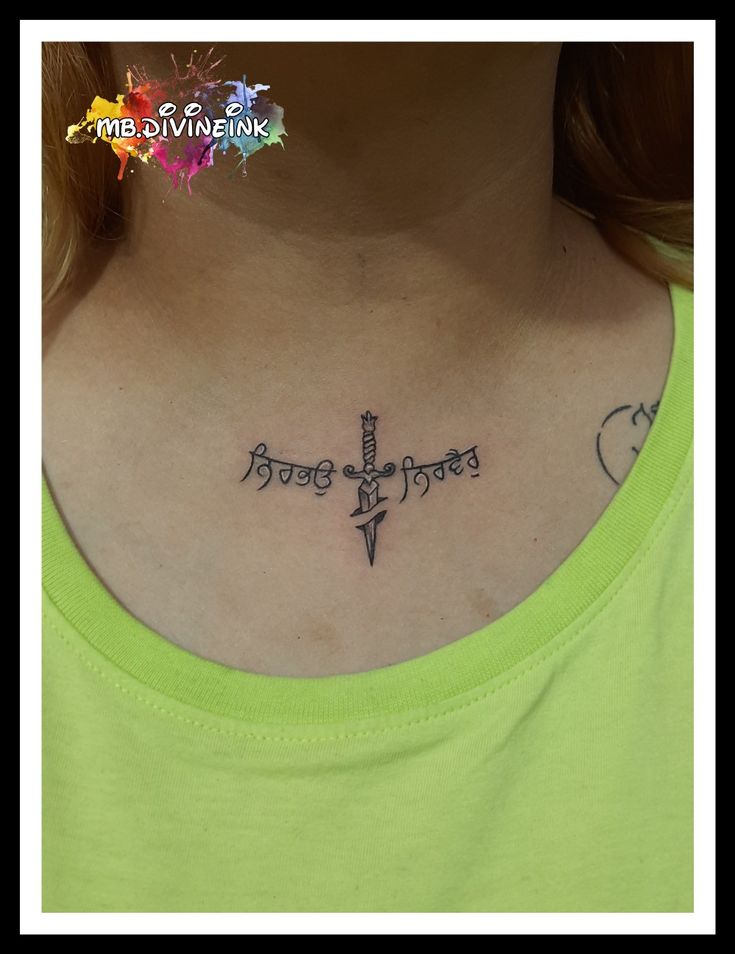 a woman with a cross tattoo on her chest and the words, hope in different languages