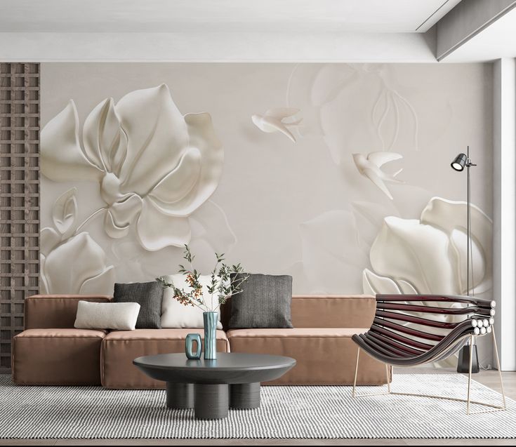 a modern living room with white flowers on the wall