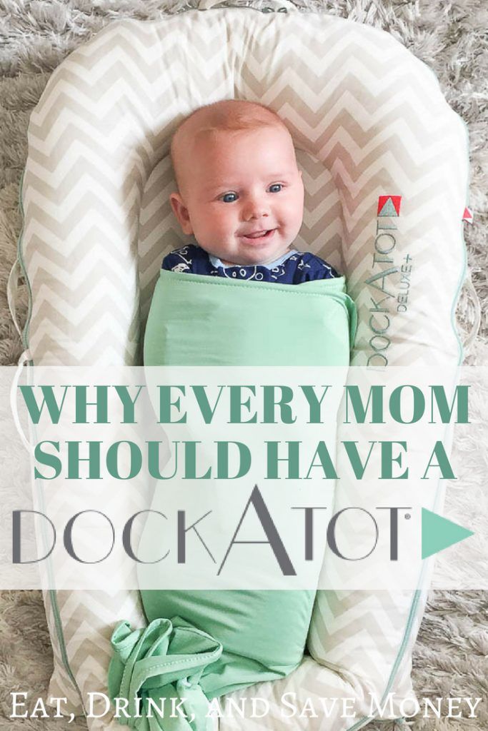 a baby in a green and white diaper with the words why every mom should have a dock atot