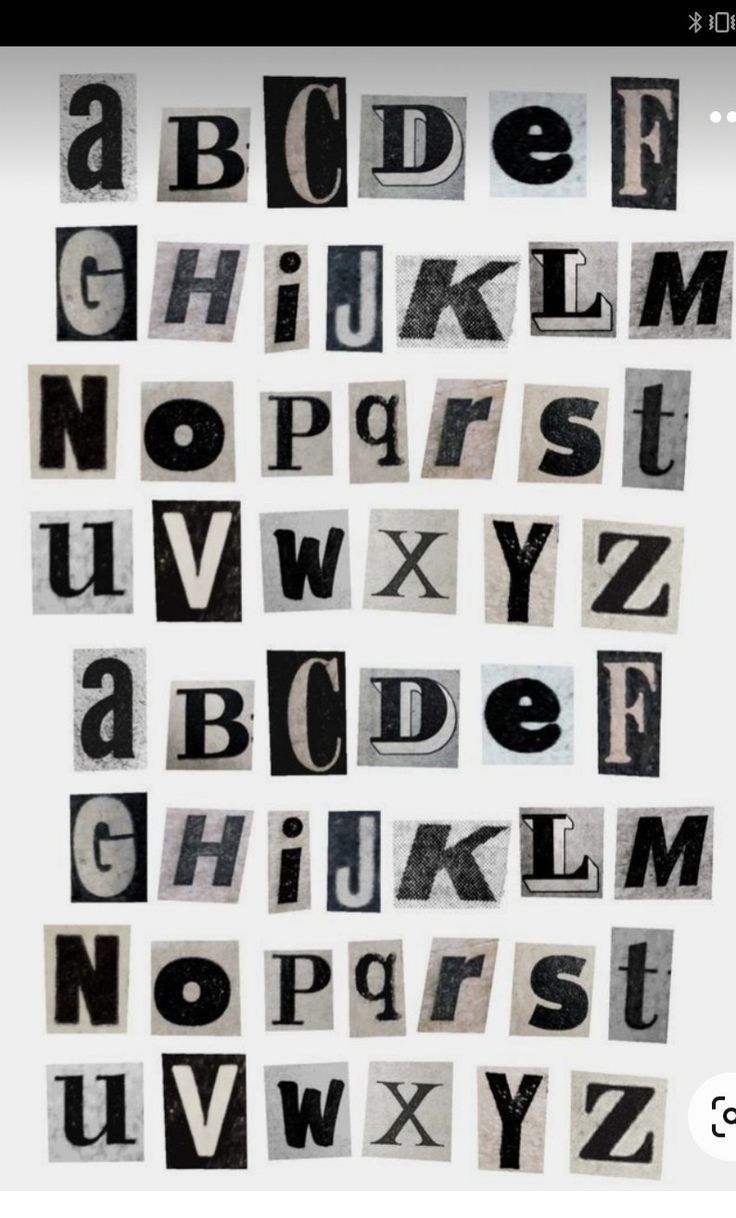 some type of alphabet that is made out of old newspaper paper with black and white letters