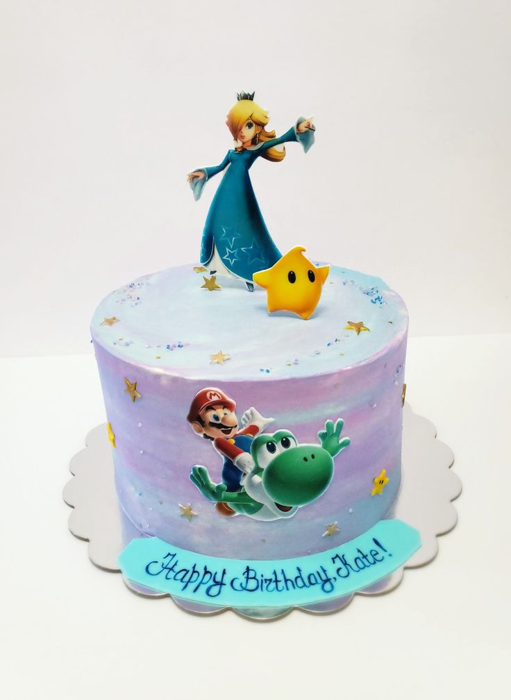 a birthday cake with an image of mario and luigi on top