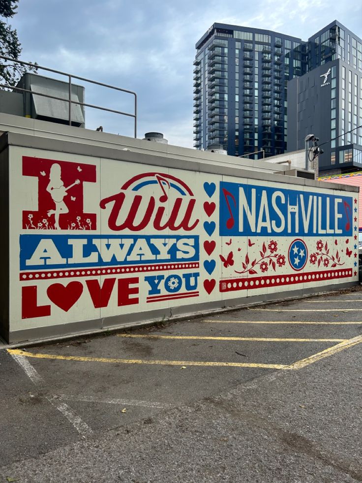 a large sign is painted on the side of a building