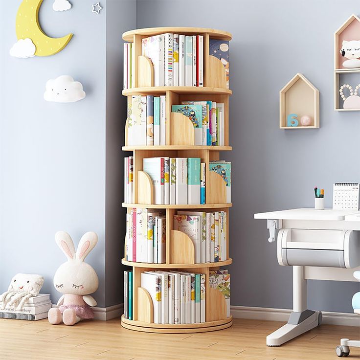 a child's room with bookshelf, desk and toy rabbit on the floor