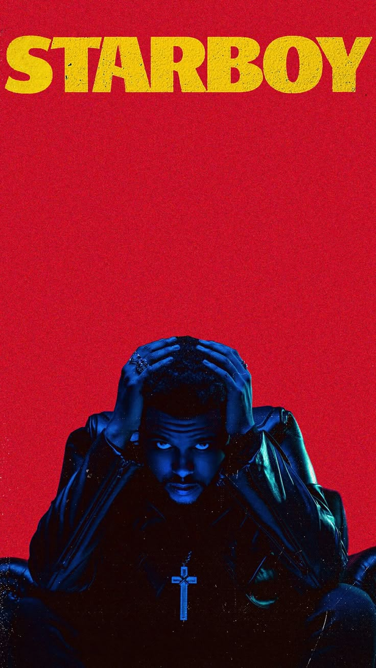 a man sitting in front of a red background with the words starboy on it