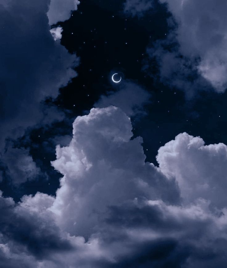 the moon is in the cloudy sky with clouds and stars above it, as well as an eclipse