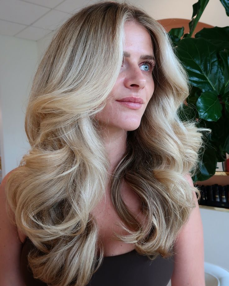 No better way to start the week than with a perfect bouncy blowout 💁‍♀️ Color and style by @sum.styles #denverblonde #denverblondespecialist #dysonairwrap #dysonblowout #blowout #denverhair #denverhairstylist #denverhairsalon Bridal Hair Down Blowout, Bridesmaid Blowout Hair, 9s Blowout Hair, Thick Blowout Hair, Brunette Bouncy Blow Dry, Bride Hair Blowout, Curl Blowout Hair, High Volume Blowout, Bridal Blowout Hair Middle Part