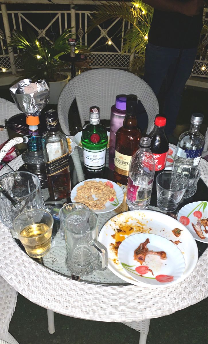 the table is full of food and drinks