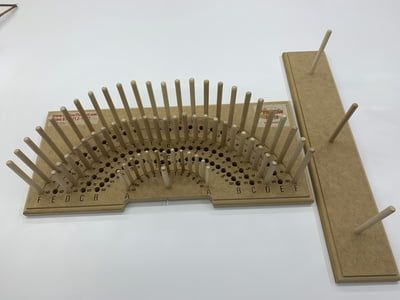 a set of wooden combs sitting on top of a table