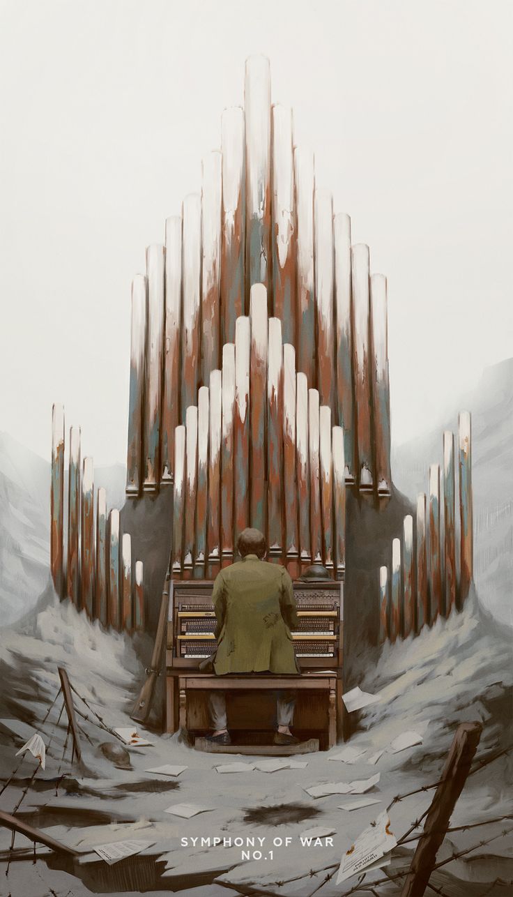 a man sitting on a bench in front of a pipe organ with his back to the camera