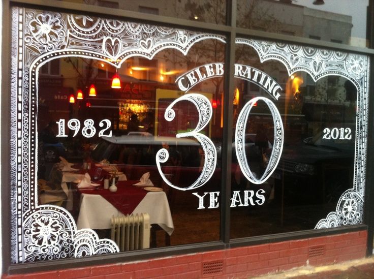 the window of a restaurant that has been decorated for 30 years