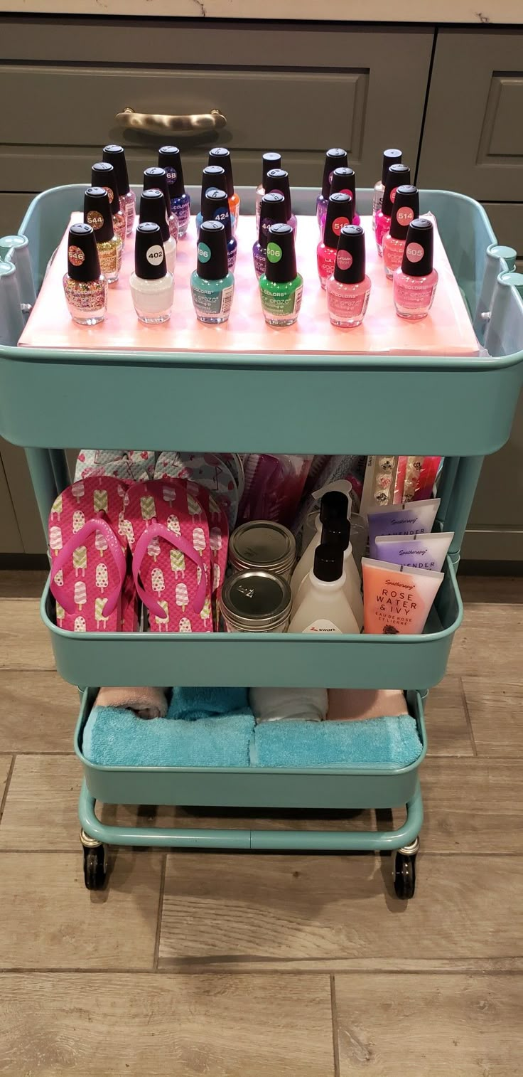 a cart filled with lots of bottles on top of a tiled floor