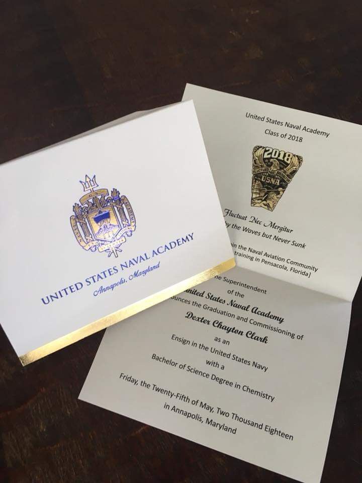 two envelopes sitting on top of each other next to an official seal and certificate