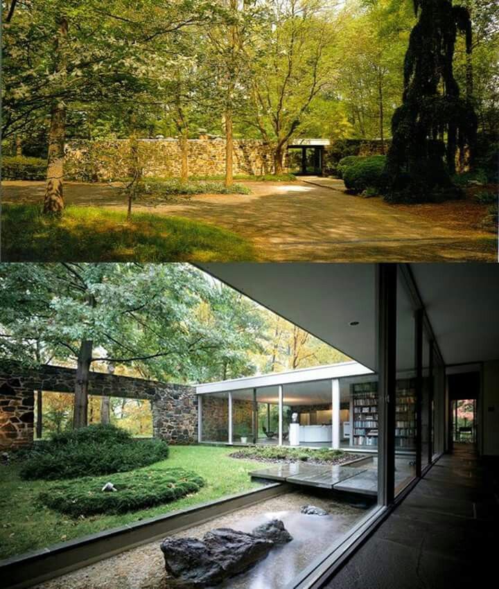 the inside and outside of a house with trees in the yard, grass on the ground