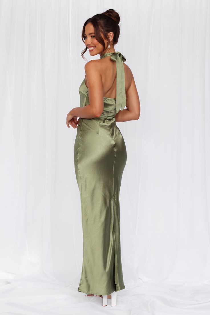 Length from neck to hem of size S: 142cm. 
 Chest: 36cm, Waist: 34cm, across front only of size S. 
 Maxi dress. 
 Lined. 
 Model is a standard XS and is wearing size XS. 
 True to size. 
 Non-stretch. 
 Luxurious satin. 
 Halter tie neckline. 
 High neck. 
 Elastic back. 
 Vent extension. 
 Straight, flowy silhouette. 
 Zipper with hook eye closure.  
 Cold hand wash only. 
 Polyester. 
 This material is very delicate. Please handle with care. 
 Please Note: This product is a Exclusive.  
 
 St Solid Satin Halter Neck Maxi Dress, Satin Ruched Halter Neck Maxi Dress, Satin Halter Neck Maxi Dress With Ruched Details, Fitted Maxi-length Bias Cut Halter Dress, Green Satin V-neck Maxi Dress, Prom Shopping, Maxi Dress Wedding, Satin Maxi, Satin Maxi Dress