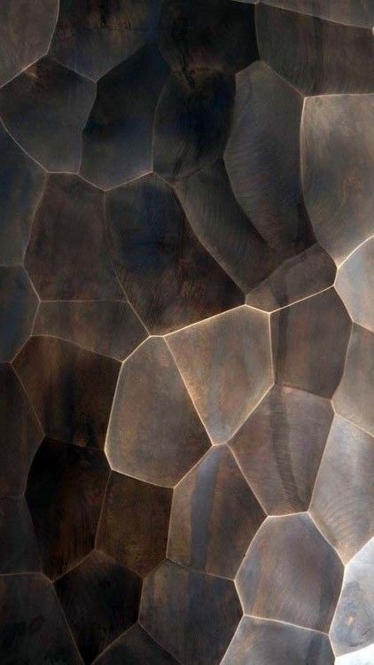 an abstract metal surface that looks like hexagonal shapes