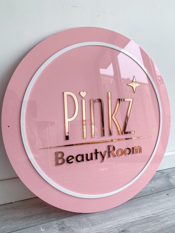 pinkz beauty room sign on the wall