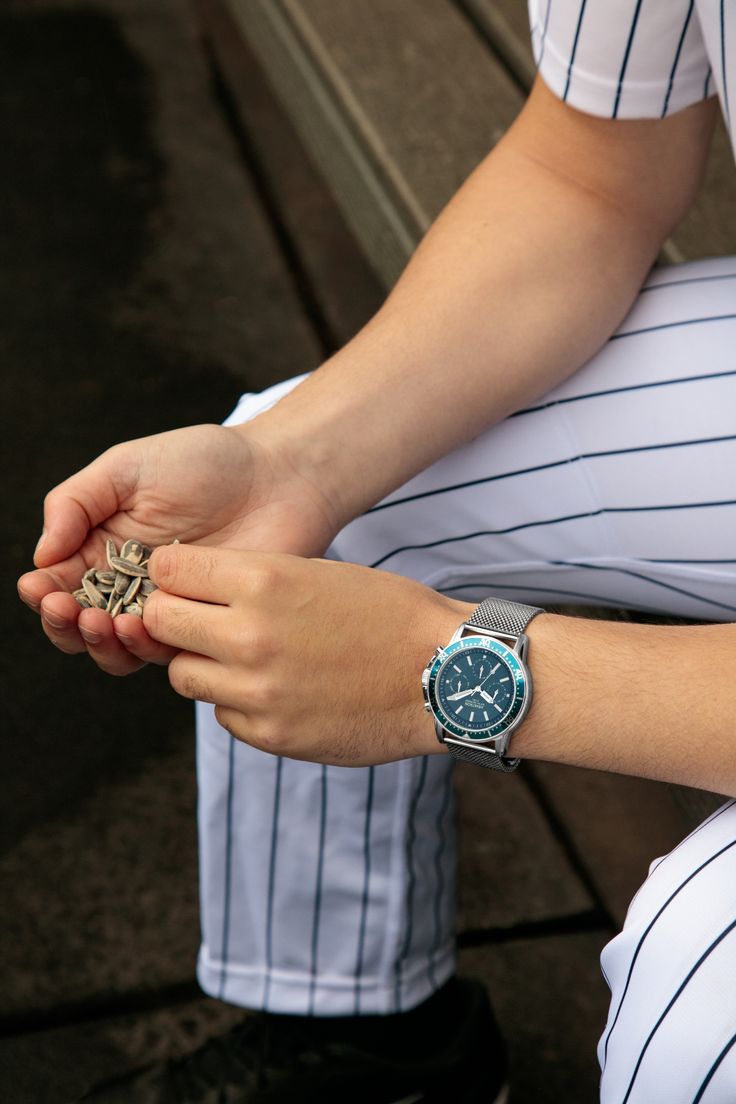 Dominate this fall sports season with sheer elegance! The Stainless Steel Charles 45mm Silvertone/Blue Mesh Watch is exquisitely designed and perfectly accentuates men's fall outfits, adding an air of sophistication to any sporting event. The silver sparkle meets a touch of blue, embodying a blend of style, strength, and poise for the modern man. Don’t miss your moment. Shop the Stainless Steel Charles 45mm Silvertone/Blue watch at Armitron. Upgrade to a new level of class. Sports Day Outfit, Mens Watches Classy, Military Time, Mens Watches Affordable, Mens Casual Watches, Mens Digital Watches, Analog Watches, Sporty Watch, Classy Watch