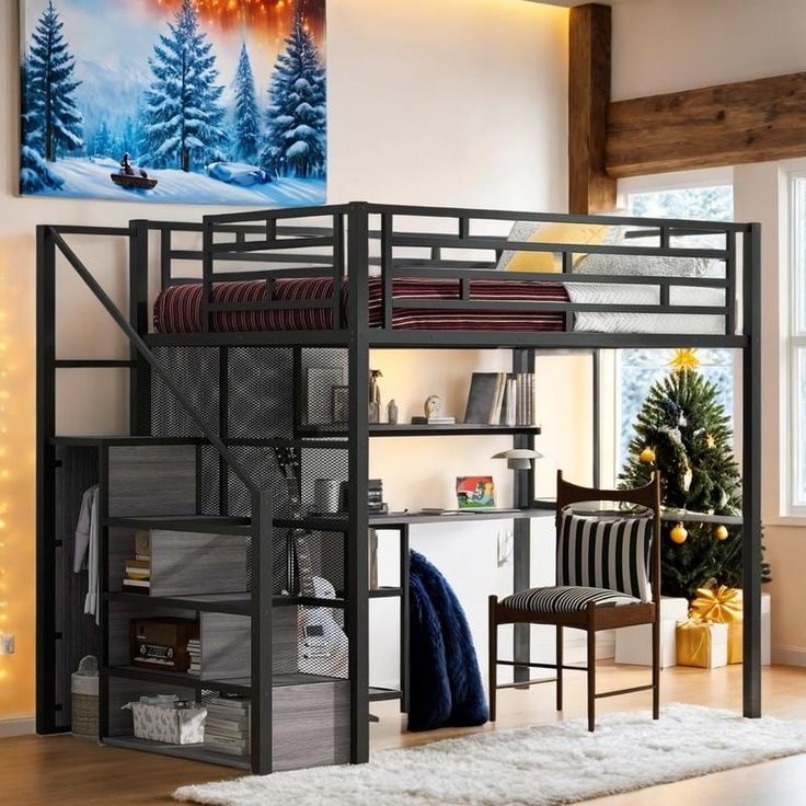 a loft bed with a desk underneath it in a living room next to a christmas tree